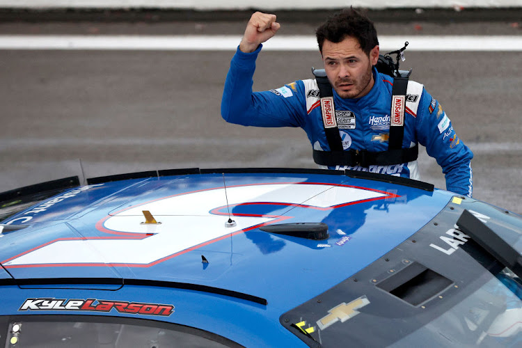 Kyle Larson celebrates after winning the NASCAR Cup Series Go Bowling at The Glen at Watkins Glen International on August 21, 2022 in Watkins Glen, New York.