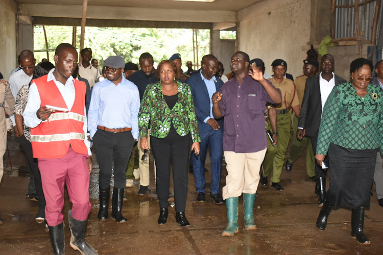 PS Omollo accampanied with others PS's Teresia Mbaika PS devolution and PS state department of performance and delivery management Veronica Nduva. at Masinde Muliro stadium in Bungoma on May,09,2024.