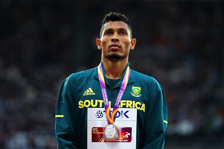 Wayde van Niekerk of South Africa poses with his silver medal for the men's 200 metres at the 16th IAAF World Athletics Championships in London in 2017.