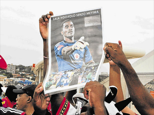 OUTRAGE: Fans during the funeral service of the late Senzo Meyiwa (SA and Orlando Pirates captain) at the Moses Mabhida Stadium on November 1 2014 in Durban Fans are pushing the police to speed up action so that justice can be done in the lagging case. Picture: GALLO IMAGES