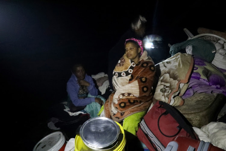 Makhauta Khole,34, looks heartbroken after her shack was burnt by fire at Dakota Informal Settlement in Isipingo.