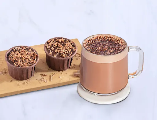 Tall Signature Hot Chocolate With Chocolate Brownie Cupcake