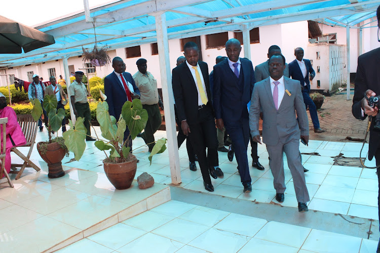 A team of health workers and Murang'a county officials accompany Governor Irungu Kang'ata during a tour of Murang'a County Referral Hospital on September 1, 2022.