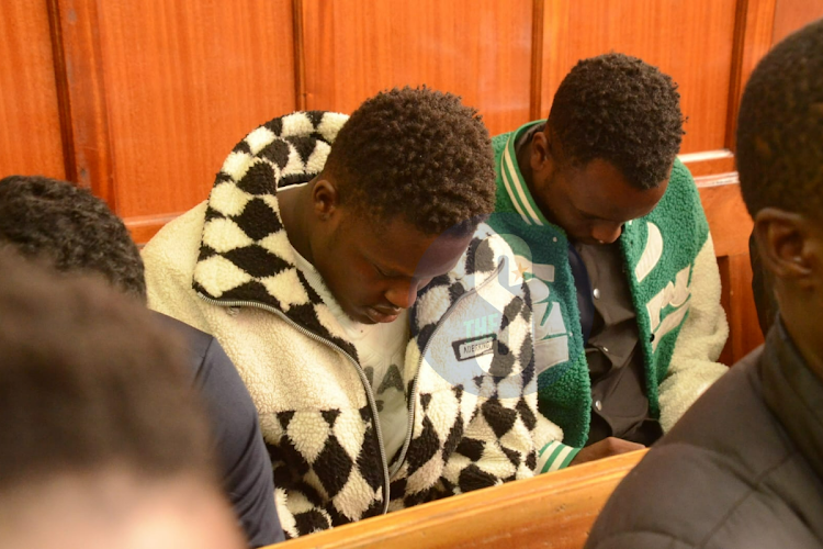 Peter Igadwa Aggrey and Peleg Mosongo Monari before Milimani magistrate Martha Nanzushi where they were charged with riding in a dangerous position along Mombasa Road, April 23, 2024.