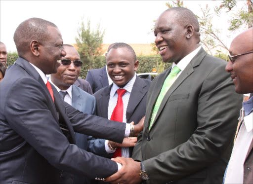 WELCOME: Deputy President William Ruto is received by Kajiado West MP Moses Sakuda and Joseph Manje (Kajiado North) at Nkoroi PcEA church yesterday.