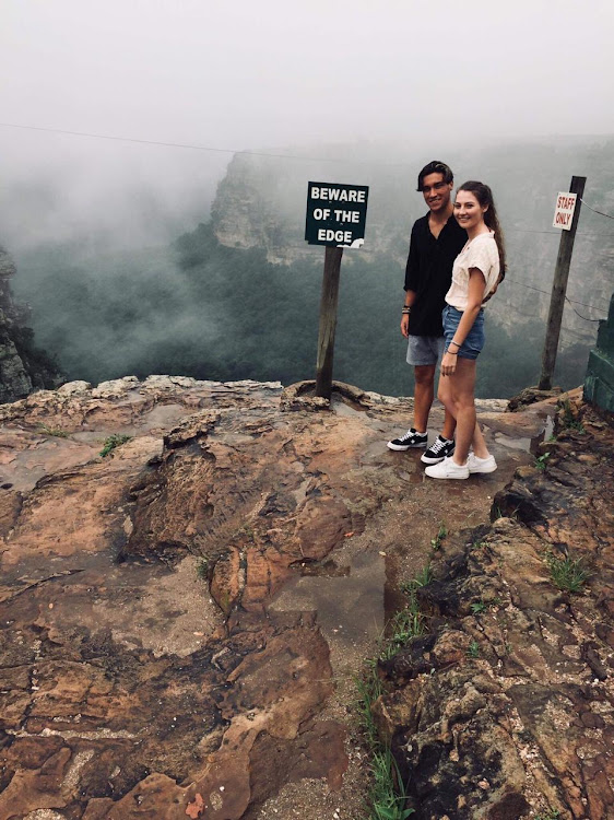 Rescued teen Jessica Bruwer with her boyfriend Dylan Mcphail on the ledge of Oribi Gorge moments before a winch motor failure left her dangling for more than two hours.