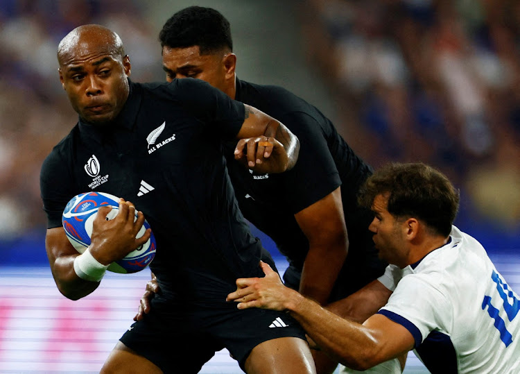 New Zealand's Mark Telea in action with France's Damian Penaud in the Rugby World Cup pool A game at Stade de France on September 8. Telea has returned to the All Blacks' XV for their semifinal against Argentina on Friday.