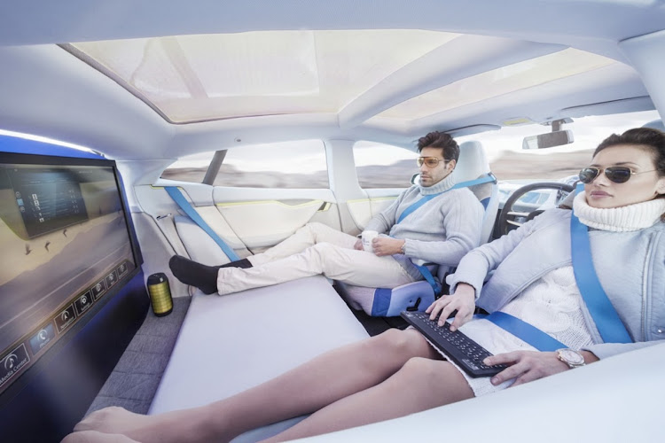 The holy grail: humans relaxing while an artificial intelligence does the driving. Picture: SUPPLIED