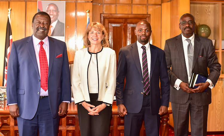 Prime Cabinet Secretary Musalia Mudavadi with World Food Programme country director Lauren Landis and other officials on February 2, 2023.