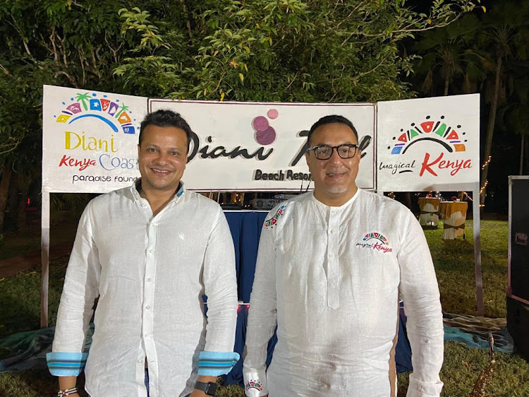 Diani Reef Beach Resort managing Director Bobby Kamani and Tourism Cabinet Secretary Najib Balala during the World Tourism Day Dinner on Monday.