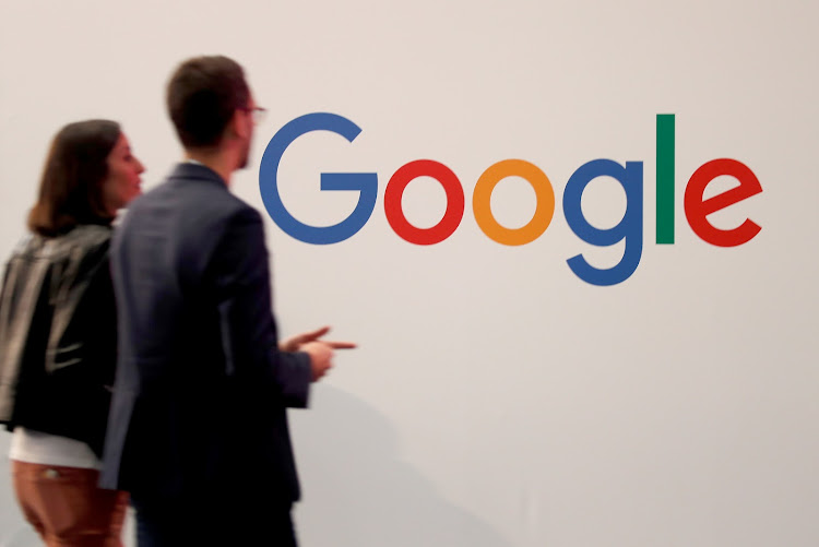 Visitors pass by the logo of Google at the high profile startups and high tech leaders gathering, Viva Tech,in Paris, France on May 16, 2019.