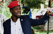 Ugandan opposition leader and singer Robert Kyagulanyi Ssentamu, known as Bobi Wine addresses a news conference in Kampala, Uganda January 26, 2021. 