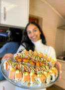 Miss SA top 10 contender Anarzade Omar with her favourite dish, sushi.