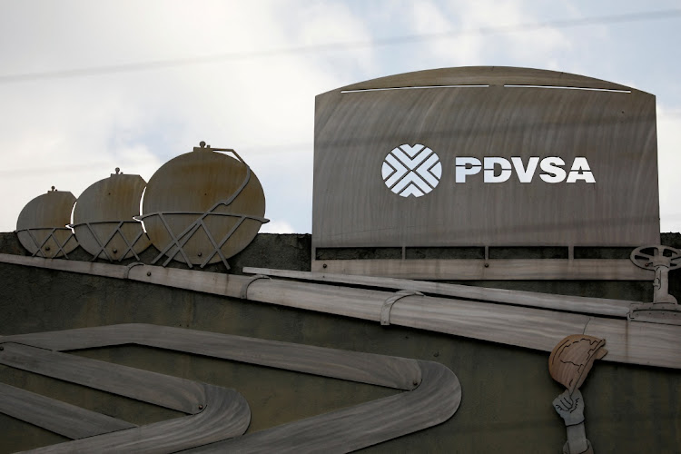 Cutouts depicting images of oil operations are seen outside a building of Venezuela's state oil company PDVSA in Caracas, Venezuela January 28 2019. Picture: REUTERS