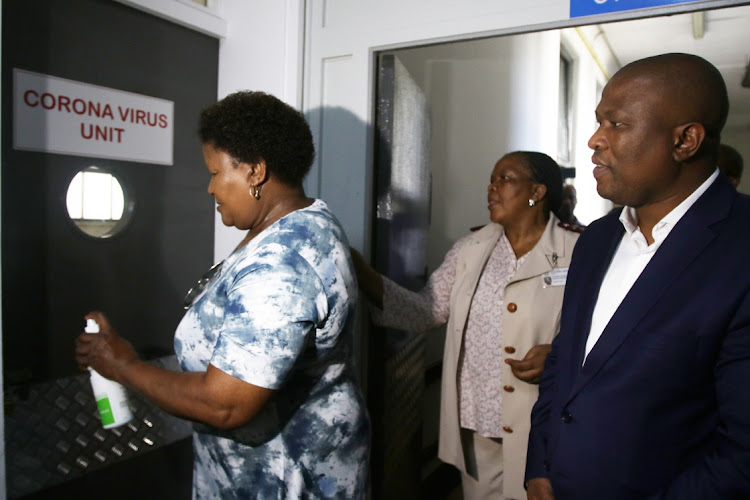 Eastern Cape MEC for Health Sindiswa Gomba, Veliswa Lujiza, nursing manager at Frere Hospital, and Eastern Cape premier Oscar Mabuyane at Frere Hospital's coronavirus unit.