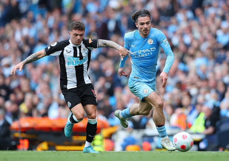 Kieran Trippier of Newcastle United challenges Jack Grealish of Manchester City in the Premier League match at Etihad Stadium in Manchester on May 8 2022.