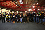 Delegates sing and dance before the start of the ANC policy conference at Nasrec. The ruling party's gathering came at a time of political and economic crisis. /Masi Losi