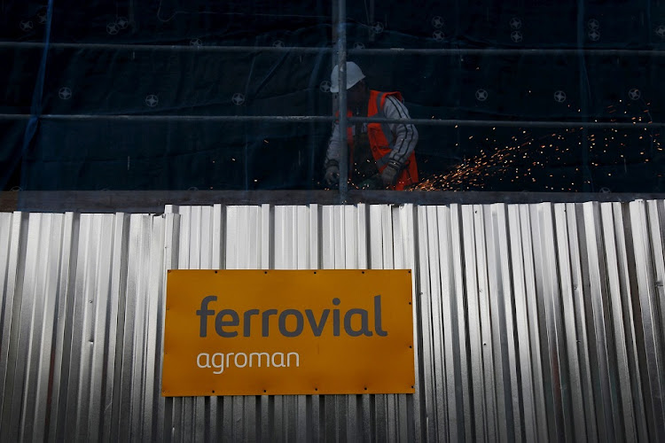 A welder works at a Ferrovial construction site in Madrid, Spain. Picture: SUSANA VERA/REUTERS