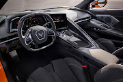 Elevated cockpit surrounds the driver with rich materials and textures, including more carbon fibre trim and new options.