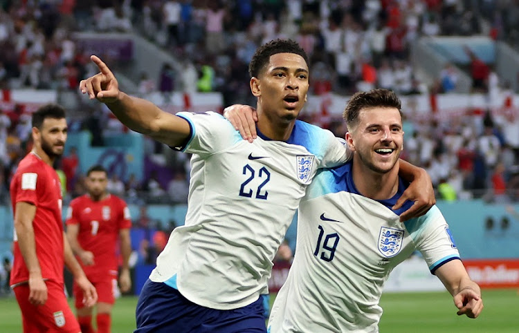 Jude Bellingham celebrates his goal with teammate Mason Mount in England's World Cup Group B win against Iran at Khalifa International Stadium on November 21. Bellingham has been ranked as the most expensive player at the tournament.