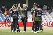 Warriors celebrate a wicket during the RAM SLAM T20 Challenge match between Warriors and WSB Cape Cobras at Buffalo Park on December 10, 2017 in East London.