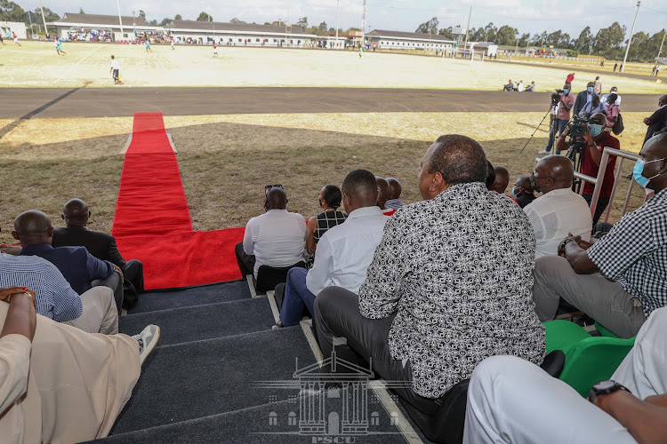 President Uhuru Kenyatta watching football after opening Phase One of the ultra-modern Jamhuri Sports Ground in Woodley, Nairobi