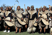 King Goodwill Zwelithini, Prince Mangosuthu Buthelezi and KZN premier Sihle Zikalala sing with the warriors at the commemoration of King Shaka at Stanger High School, KwaDukuza, on Tuesday