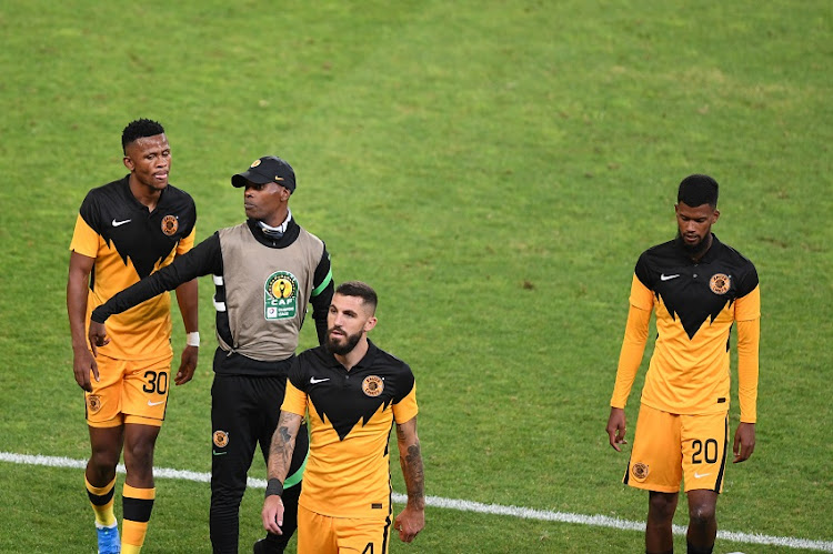 Kaizer Chiefs assistant coach Arthur Zwane with Siyabonga Ngezana,Daniel Cardoso and Yagan Sasman during the CAF Champions League match between Kaizer Chiefs and Wydad Athletic at FNB Stadium on April 03, 2021 in Johannesburg, South Africa.