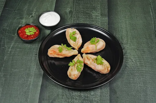 Veg Schezwan Steamed Momos [8 Pieces]