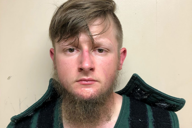 Robert Aaron Long, 21, of Woodstock in Cherokee County poses in a jail booking photograph after he was taken into custody by the Crisp County Sheriff's Office in Cordele, Georgia, US. March 16, 2021.