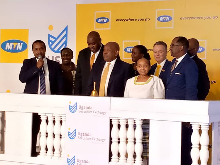 ICT minister Chris Baryomunsi, MTN Chairman Charles Mbiire, MTN CEO Wim Vanhalleputte, NSSF MD Richard Byarugaba