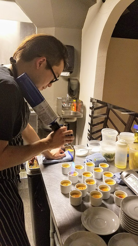 Imperial Session New England Beer Dinner, Spencer playing with fire while making Horchata Creme Brulee