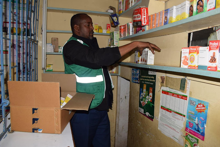 Officials from the Pharmacy and Poisons Board during an ongoing crackdown on illegal pharmacies in Nairobi and parts of Kajiado counties