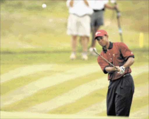 Presidents cup player Tiger Woods, at Fancourt's the links in George. 23/11/2003 pic by sydney seshibedi