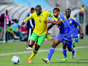 LIVEWIRE:
       Bafana Bafana midfielder Judas Moseamedi evades 
      
       Njabulo Ndlovu of Swaziland during their Cosafa Cup semifinal  
      
      in Windhoek last night  
      PHOTO: Muzi Ntombela/BackpagePix