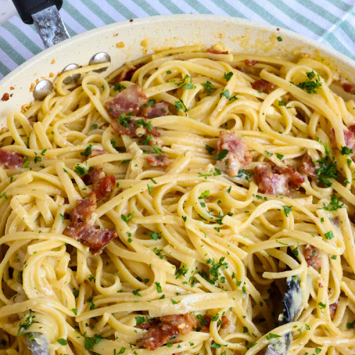 Pasta Carbonara is a unique and easy pasta dish that combines linguine or spaghetti with crisp pan-fried bacon in a creamy Parmesan Carbonara Sauce.