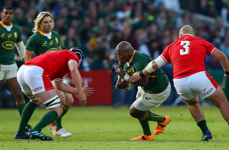 Springbok hooker Bongi Mbonambi, one of South Africa's try scorers, goes on the run in the win over Wales at Loftus on July 2 2022.