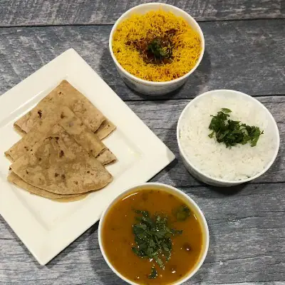 Sev Tomato Sabji With Phulka Roti & Dal Rice