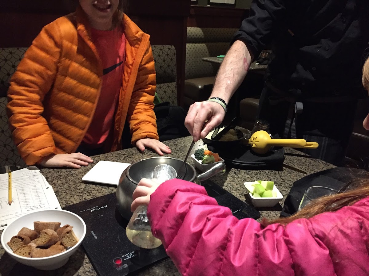 Letting kids prep ingredients for GF Cheese Fondue