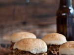 Slow Cooker Beer and Brown Sugar Pulled Chicken Sliders was pinched from <a href="http://thebeeroness.com/2013/11/01/slow-cooker-beer-brown-sugar-pulled-chicken-sliders/" target="_blank">thebeeroness.com.</a>