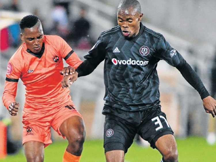 Vusimusi Mngomezulu, of Polokwane City, and Asavela Mbekile, of Orlando Pirates, during their Absa Premiership match at the Peter Mokaba Stadium in Polokwane