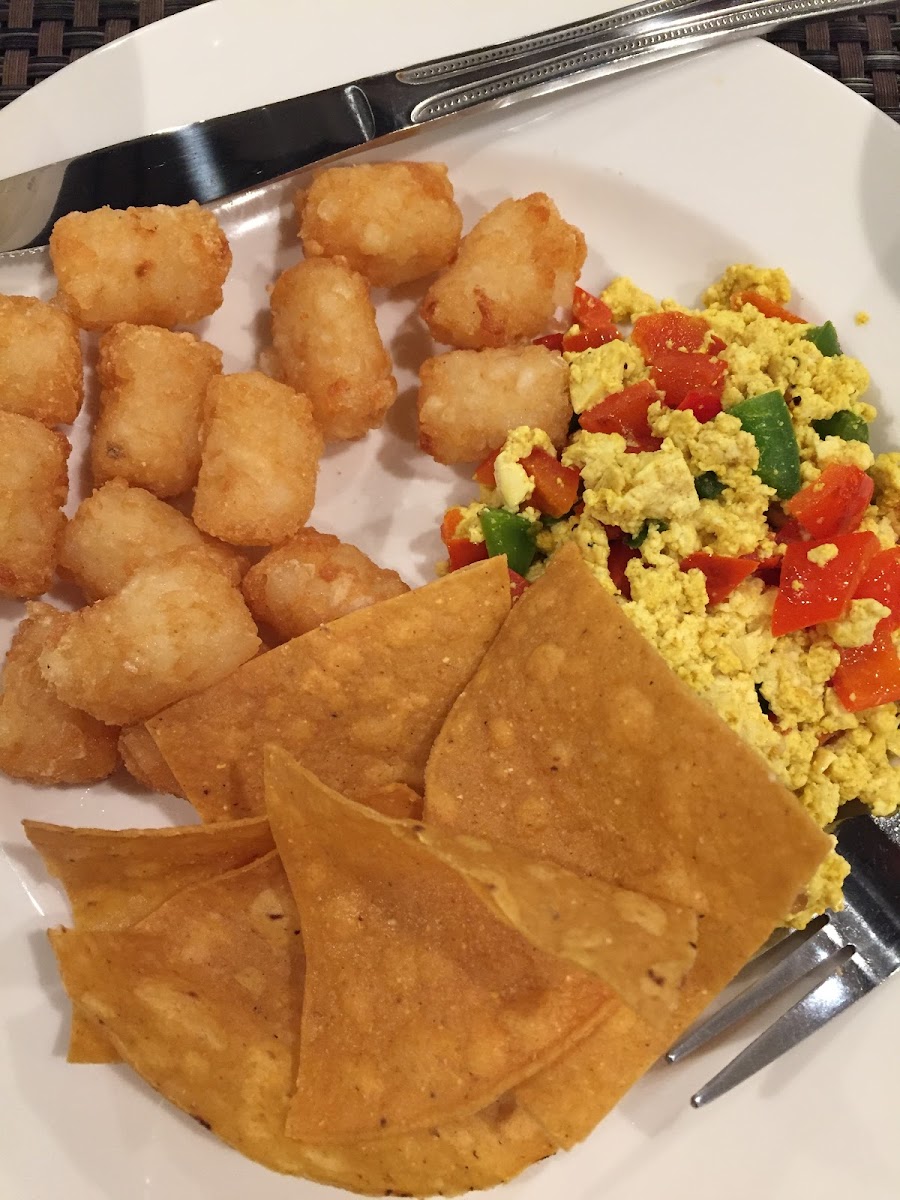 Tater tots, chips, eggs and peppers