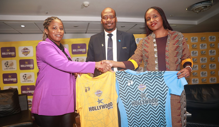 Indira Albuquerque of Hollywoodbets, Safa vice-president Linda Zwane and Safa CEO Lydia Monyepao at Safa House in Johannesburg.