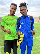 Mamelodi Sundowns star Themba Zwane with VUT midfielder Bokang Madiehe.