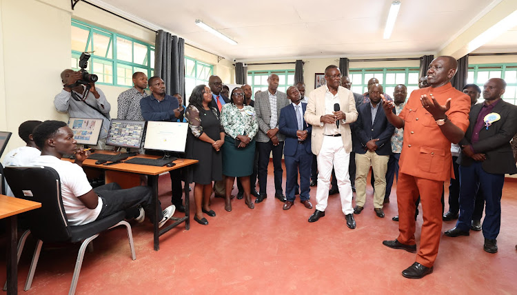 President William Ruto and ICT CS Eliud Owalo at URIRI Technical and Vocational College Konza Digital Skill Laboratory on October 8, 2023.