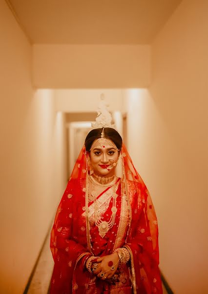 結婚式の写真家Koushik Chakraborty (t0u3yyk)。2022 3月17日の写真