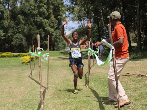 Lorna Nyabochoa during the Discovery Cross Country at Kisii Golf Course yesterday. /ANGWENYI GICHANA