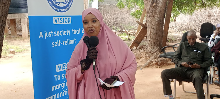 Garissa County Gender and Youth executive Hawa Abdi speaking at the ceremony.