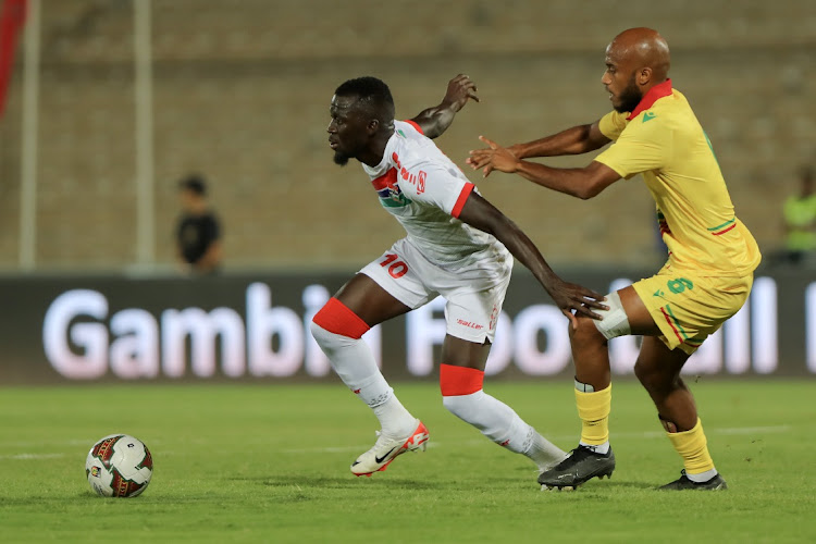 Fred Jose Dembi of Congo challenges Musa Barrow of Gambia during the 2023 Africa Cup of Nations Qualifiers match between Gambia and Congo at Marrakech Stadium in Marrakech, Morocco on 10 September 2023.