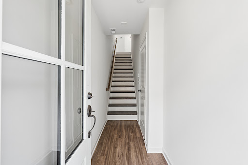 Entryway with staircase, glass door - Luxury property for sale in Atlanta, 2 bedrooms